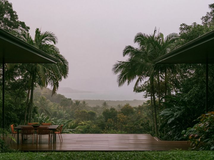 A deep deck on the shaded side, looking down to the water