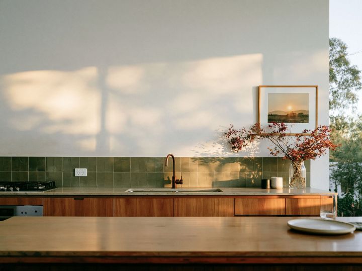 Green tile and a long timber run, the pantry behind