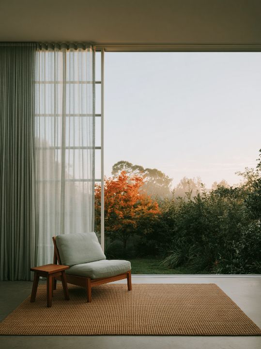 Linen, a timber chair and the morning coming through